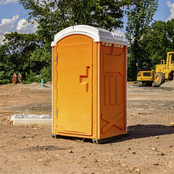 what is the cost difference between standard and deluxe porta potty rentals in Highmount